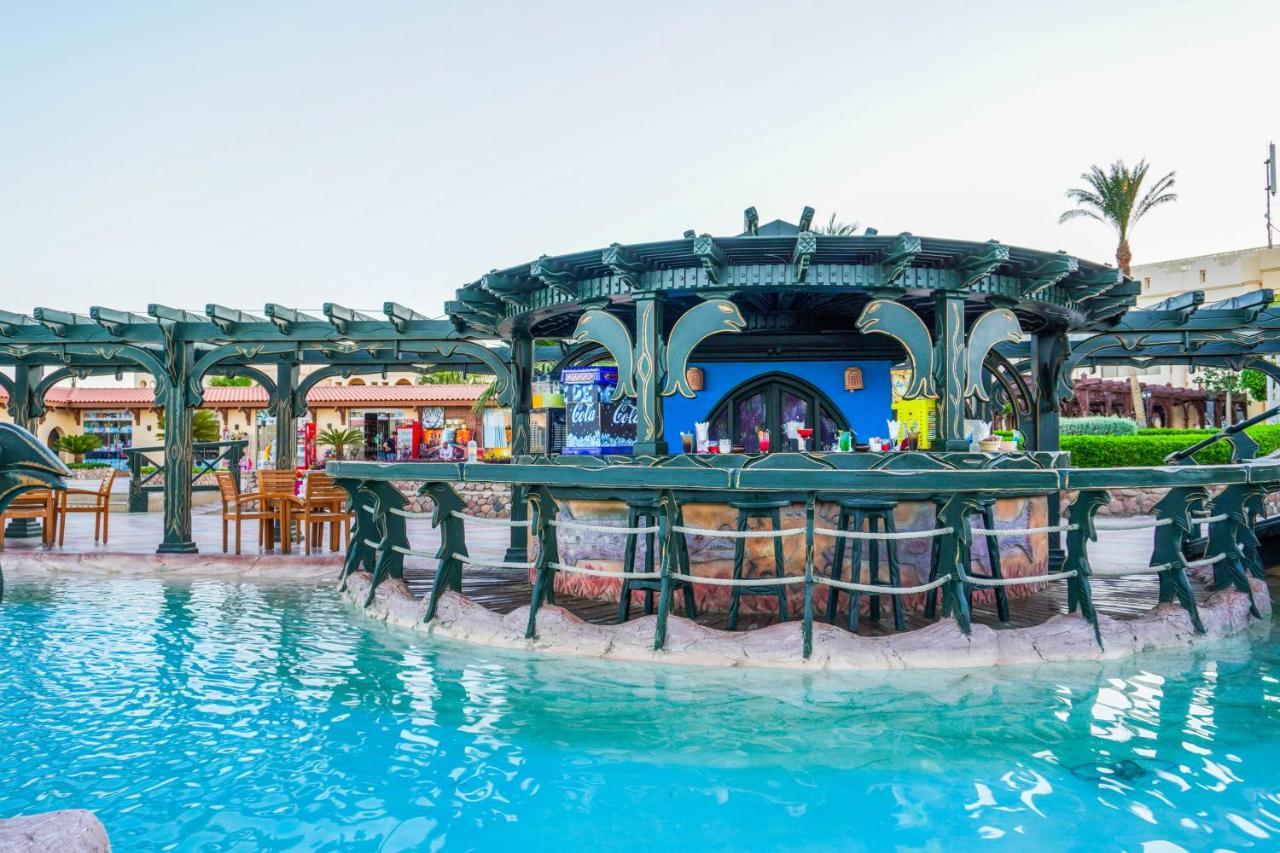 Charmillion Club Resort シャルム・エル・シェイク エクステリア 写真 The swimming pool at the hotel